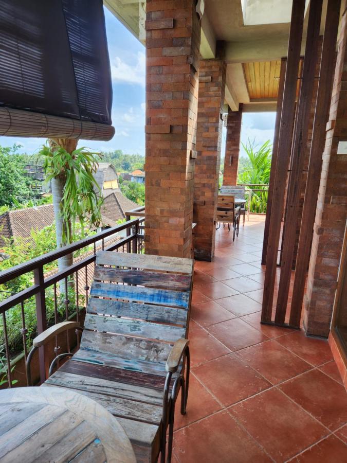 Buda Amitaba Ubud  Bilik gambar